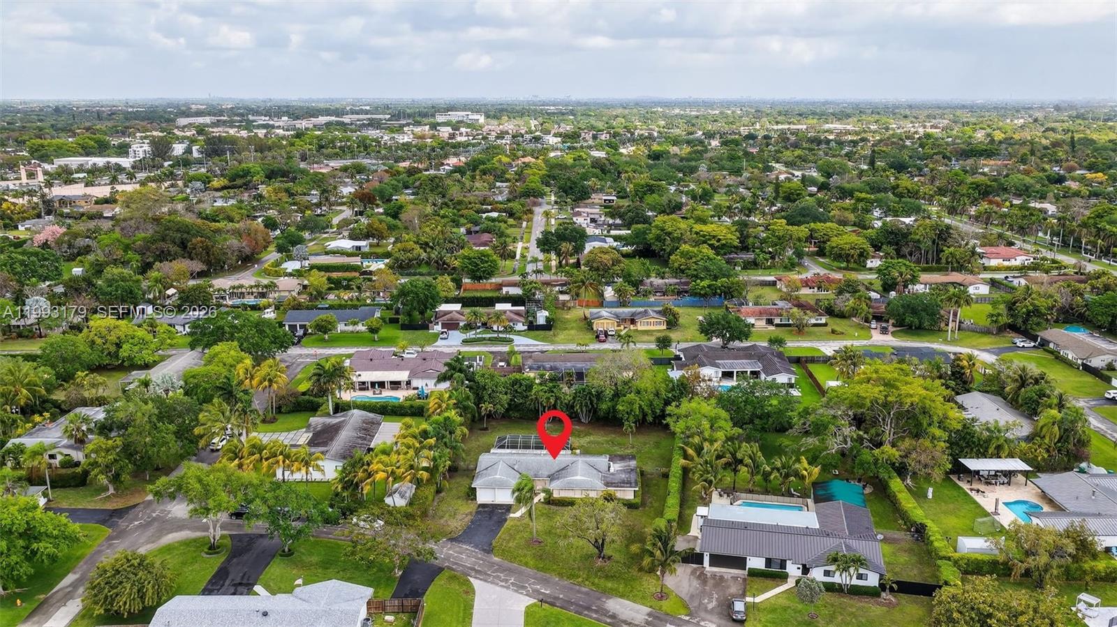 10753 Southwest 118th Street Miami, FL 33176 - Photo 46 of 51 an aerial view of residential houses with outdoor space and trees