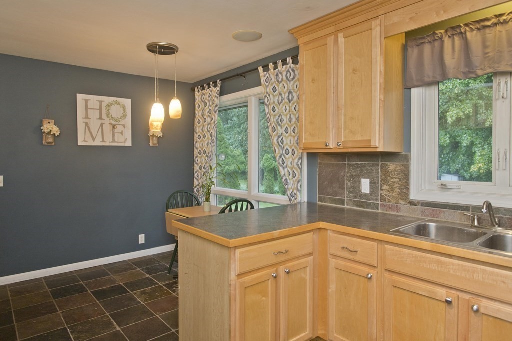 73 Bremen Street Springfield, MA 01108 - Photo 12 of 42 a kitchen with a sink and a window