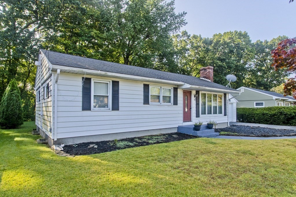 73 Bremen Street Springfield, MA 01108 - Photo 2 of 42 a front view of house with yard and green space