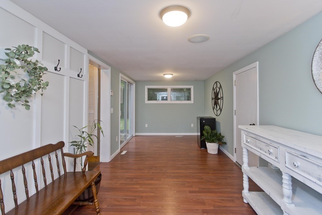 73 Bremen Street Springfield, MA 01108 - Photo 32 of 42 a view of an entryway with wooden floor and a potted plant