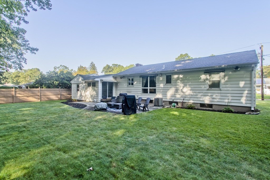73 Bremen Street Springfield, MA 01108 - Photo 40 of 42 a view of a house with backyard sitting area and garden
