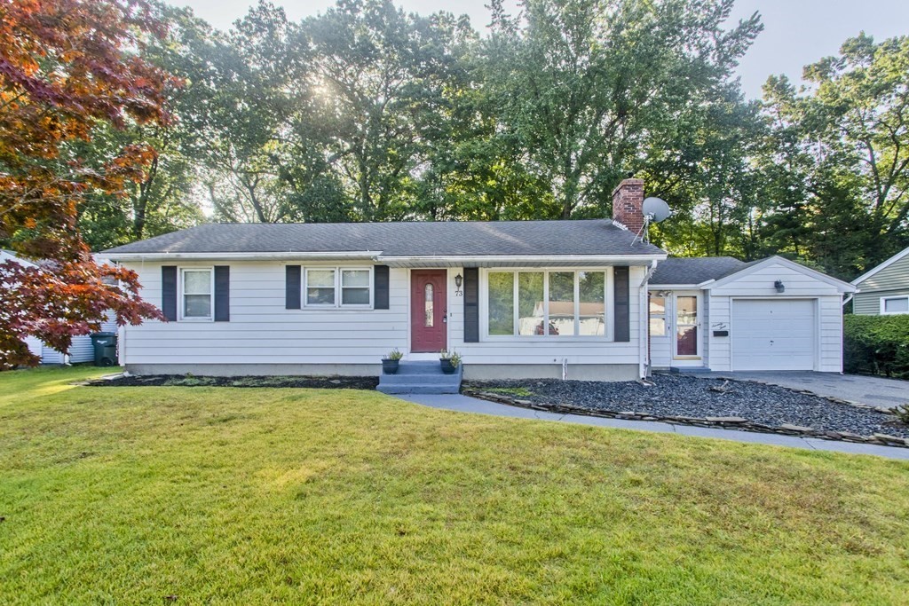 73 Bremen Street Springfield, MA 01108 - Photo 42 of 42 a front view of a house with a garden