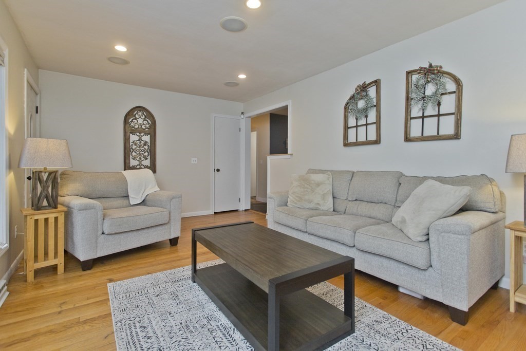 73 Bremen Street Springfield, MA 01108 - Photo 6 of 42 a living room with furniture and a couch