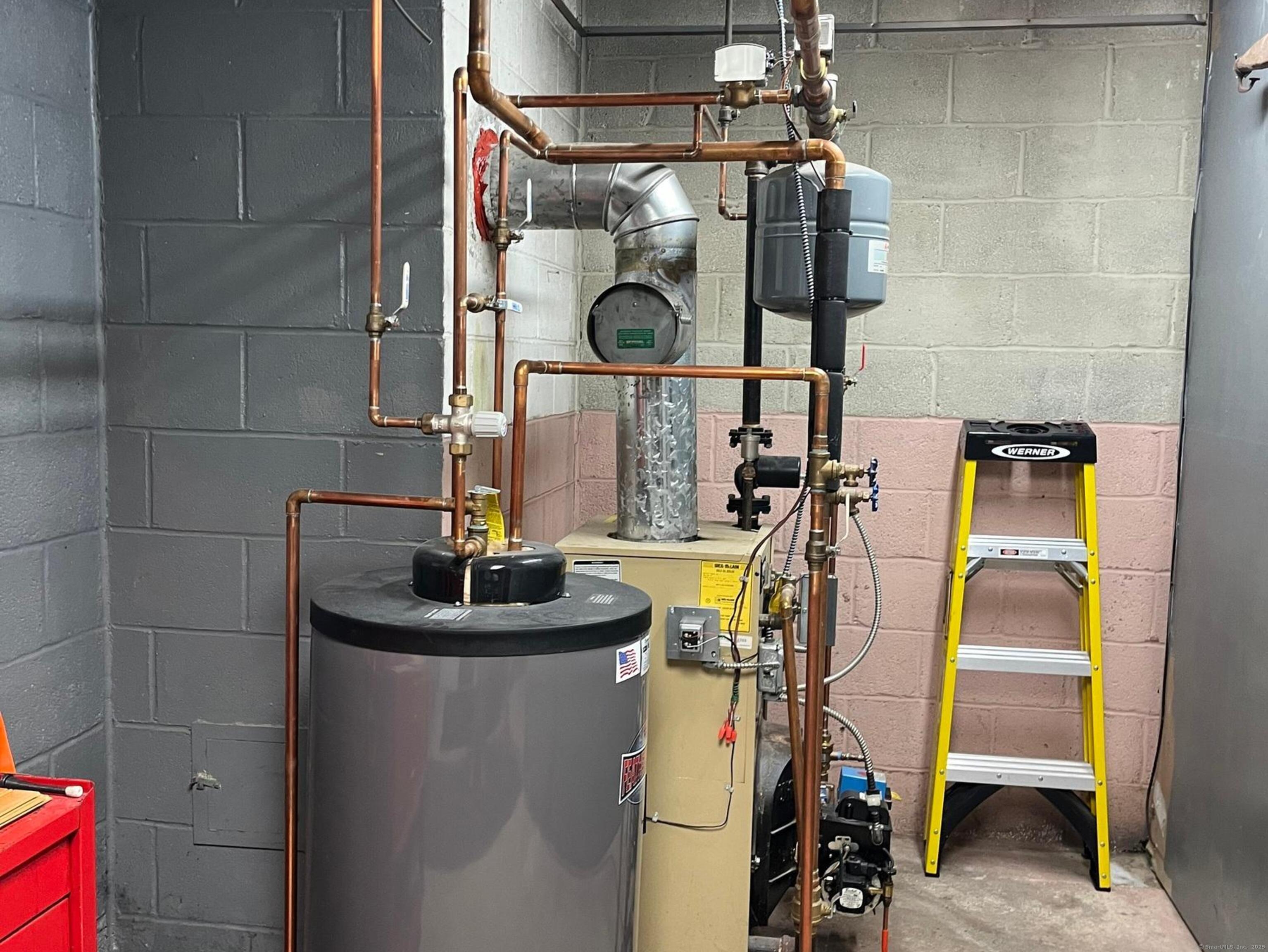 213 Spring Street Torrington, CT 06790 - Photo 17 of 25 a utility room with dryer and washer