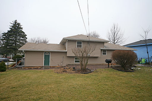N141 Prince Crossing Road West Chicago, IL 60185 - Photo 12 of 13 a front view of a house with yard