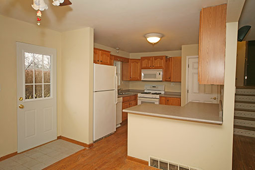 N141 Prince Crossing Road West Chicago, IL 60185 - Photo 5 of 13 a kitchen with stainless steel appliances a refrigerator and microwave
