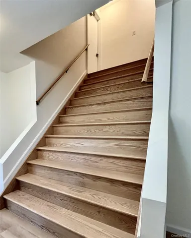 a kitchen with stainless steel appliances granite countertop a refrigerator sink and stove