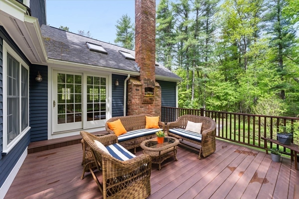 94 Middleton Road Boxford, MA 01921 - Photo 11 of 36 a view of a patio with wooden floor