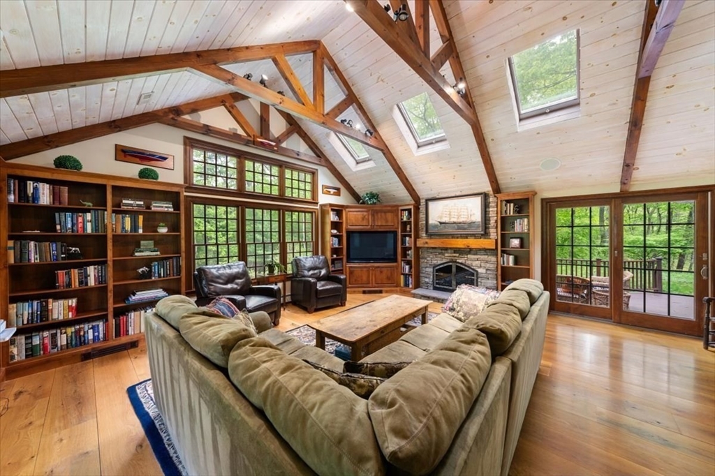 94 Middleton Road Boxford, MA 01921 - Photo 12 of 36 a living room with furniture fireplace and a large window