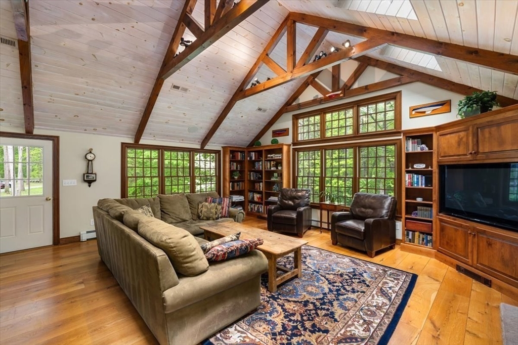 94 Middleton Road Boxford, MA 01921 - Photo 13 of 36 a living room with furniture tv and a table