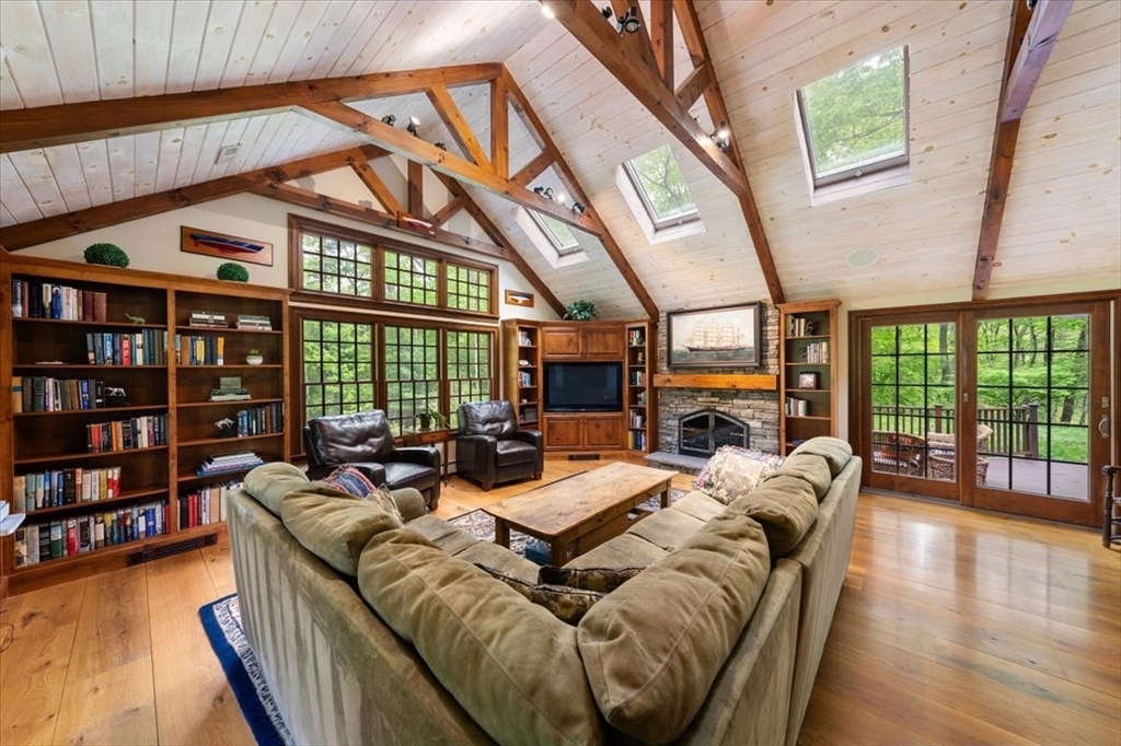 94 Middleton Road Boxford, MA 01921 - Photo 17 of 36 a living room with furniture fireplace and a large window