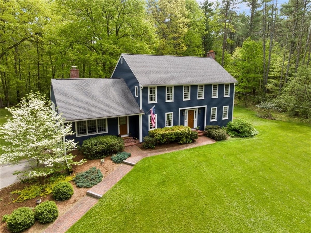 94 Middleton Road Boxford, MA 01921 - Photo 2 of 36 front view of a house with a yard