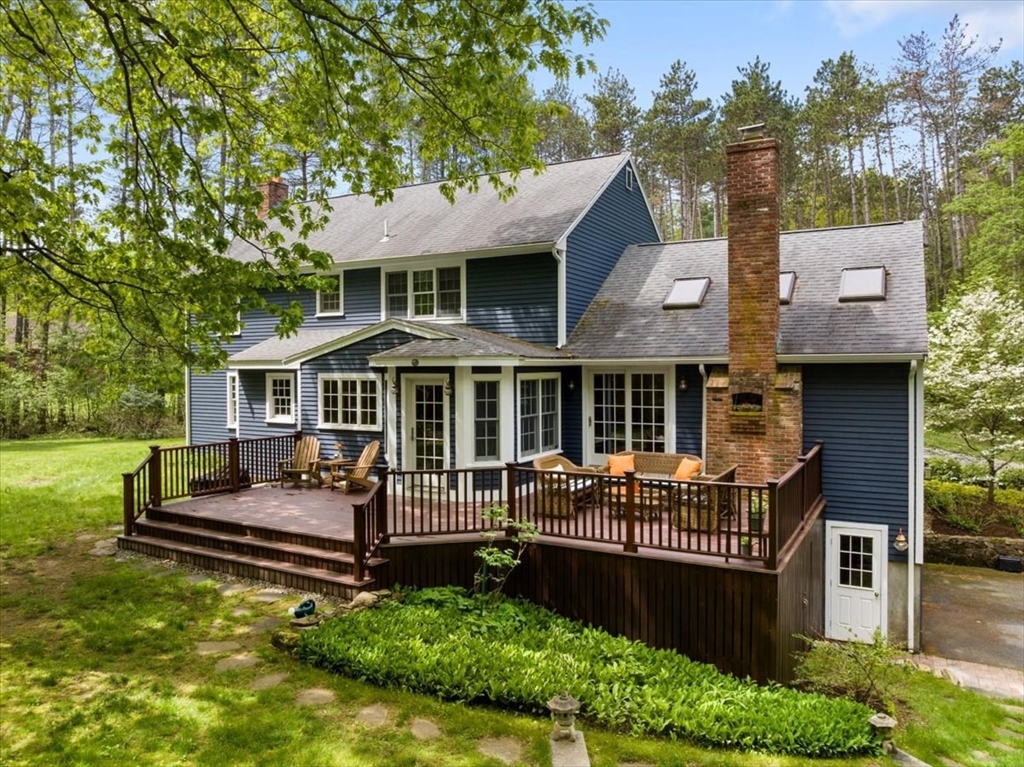 94 Middleton Road Boxford, MA 01921 - Photo 3 of 36 a front view of a house with garden