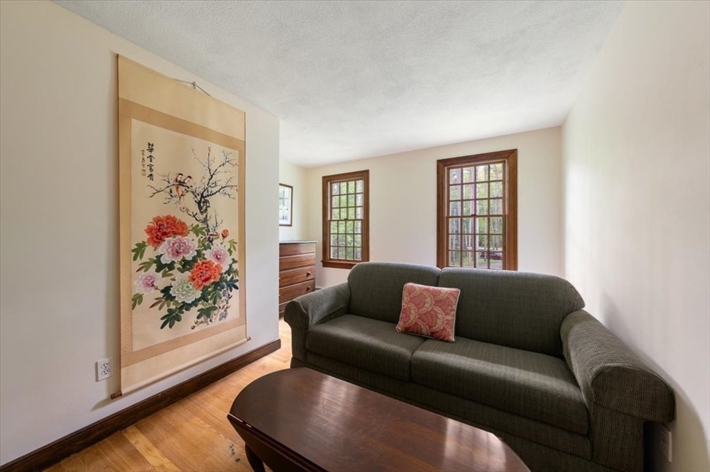94 Middleton Road Boxford, MA 01921 - Photo 34 of 36 a living room with furniture and a window