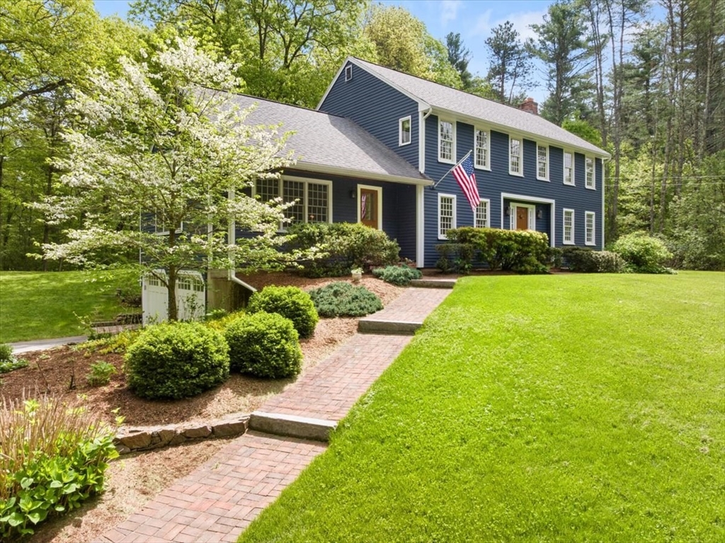 94 Middleton Road Boxford, MA 01921 - Photo 4 of 36 a front view of a house with a yard