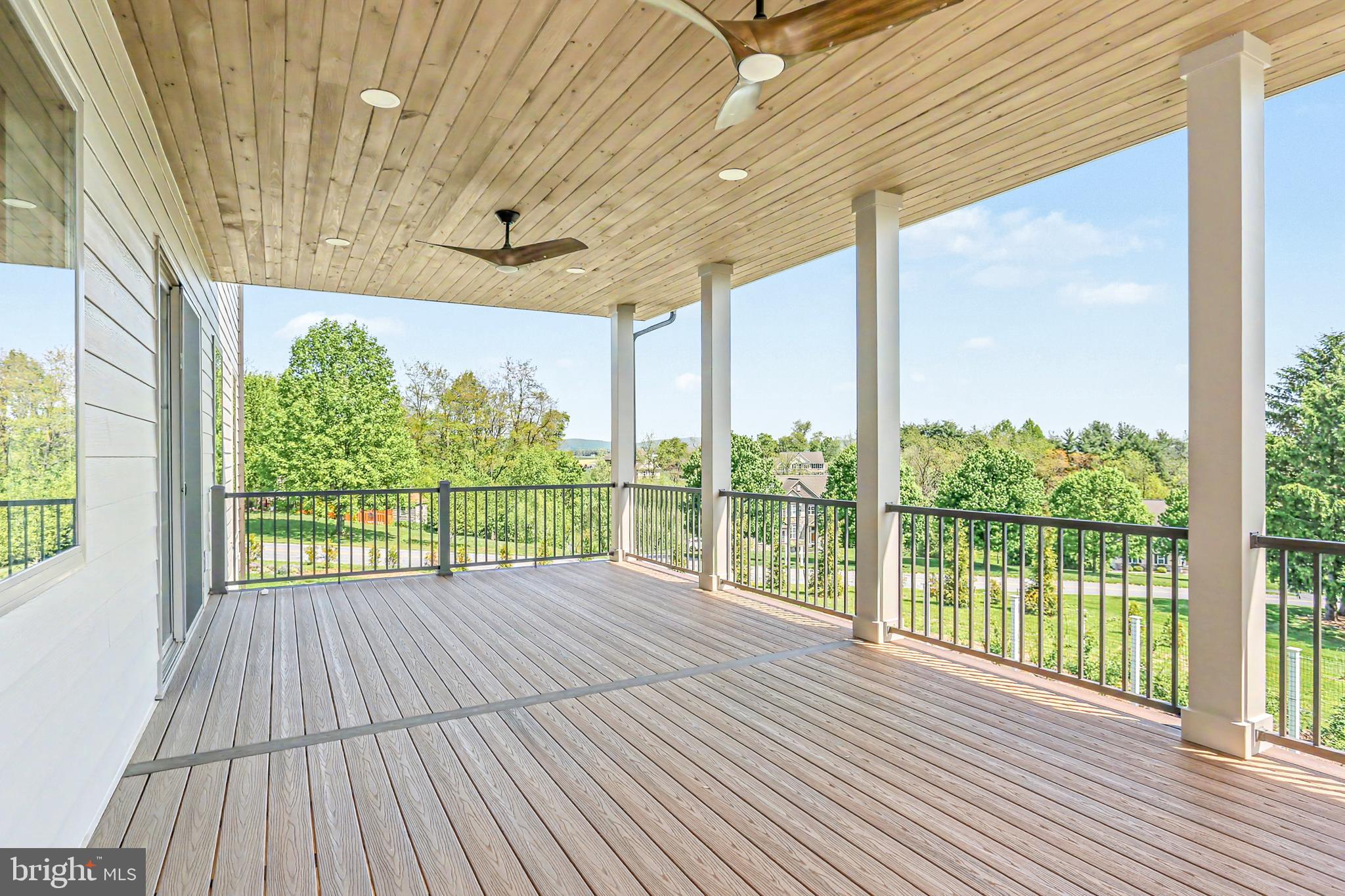 1 Strawberry Lane Lititz, PA 17543 - Photo 12 of 102 a view of a room with wooden floor and outdoor space