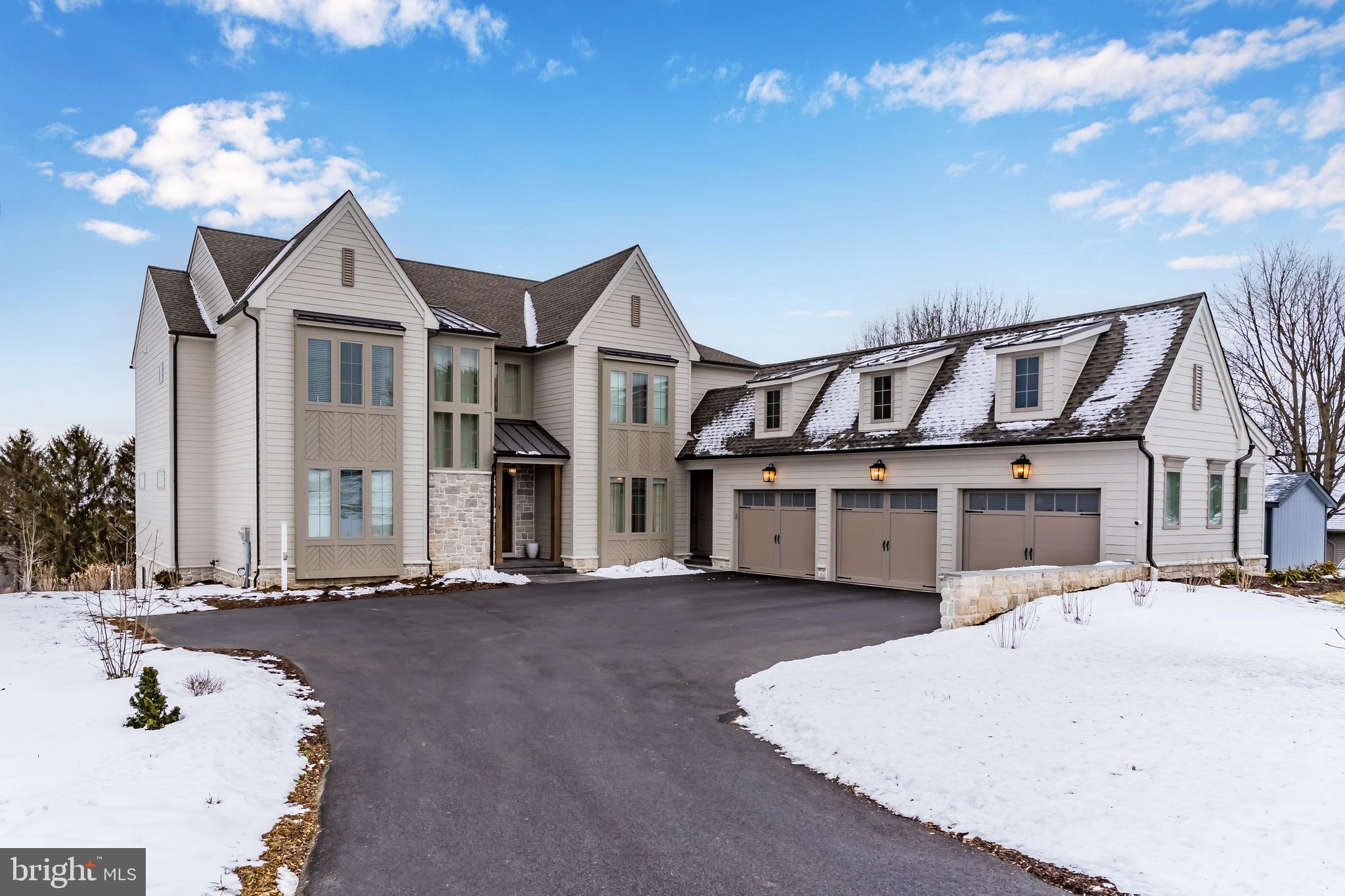 1 Strawberry Lane Lititz, PA 17543 - Photo 13 of 80 a front view of a house with a yard