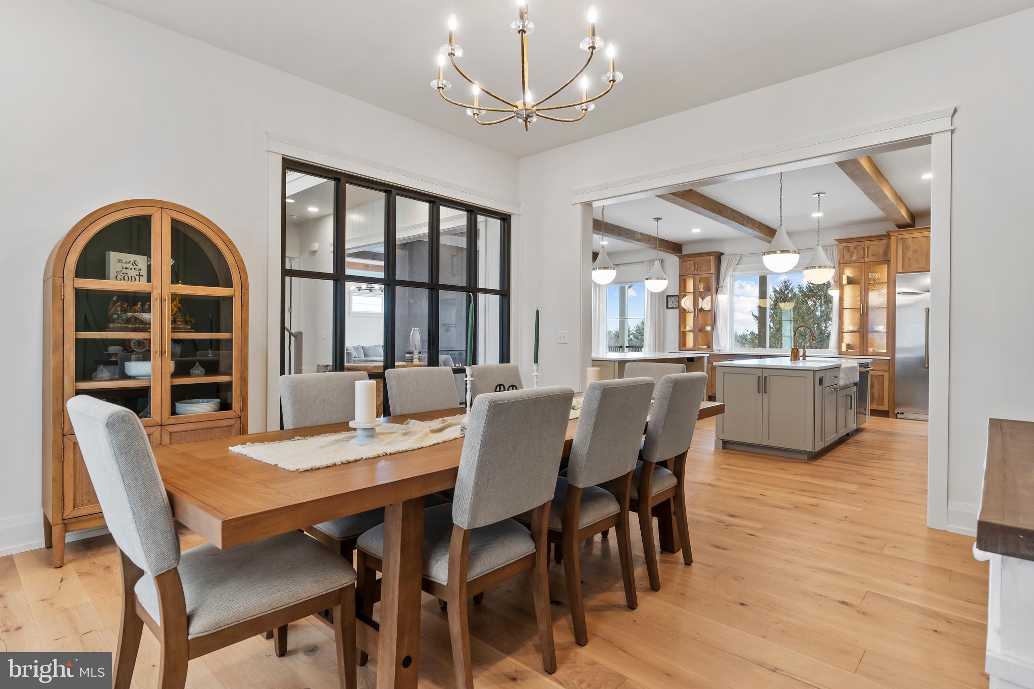 1 Strawberry Lane Lititz, PA 17543 - Photo 21 of 80 a view of a dining room with furniture window and wooden floor