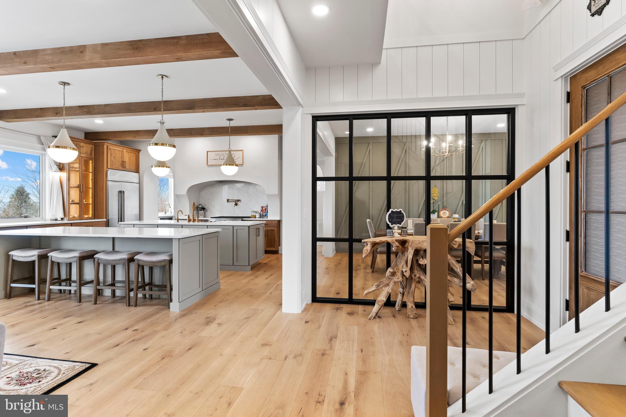 1 Strawberry Lane Lititz, PA 17543 - Photo 23 of 80 a view of a dining room with furniture window and wooden floor