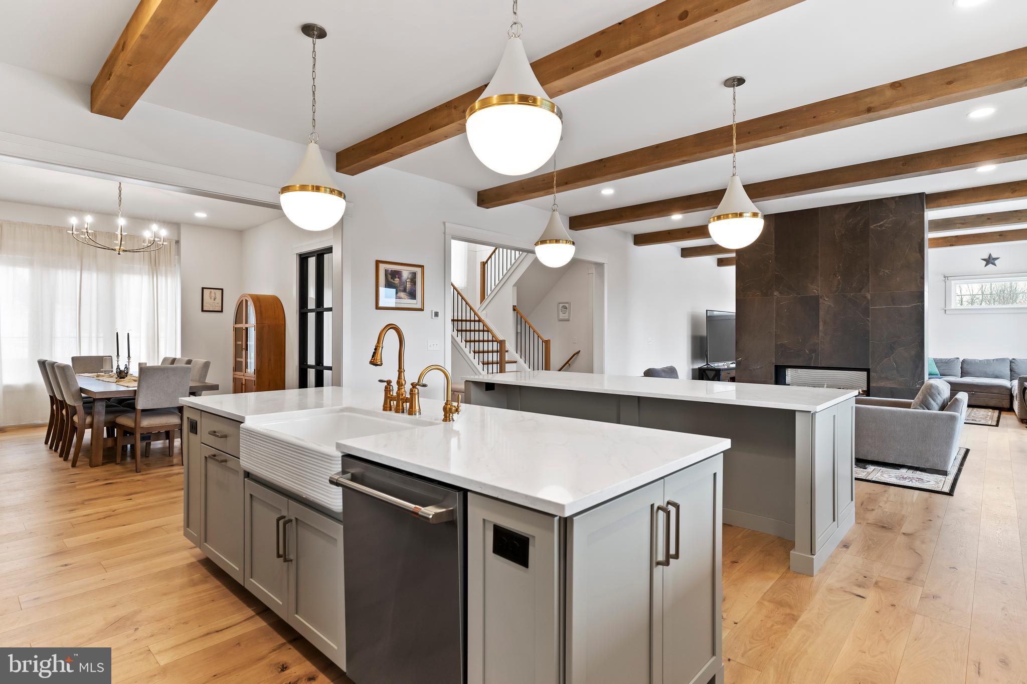 1 Strawberry Lane Lititz, PA 17543 - Photo 25 of 80 a large kitchen with a table and chairs