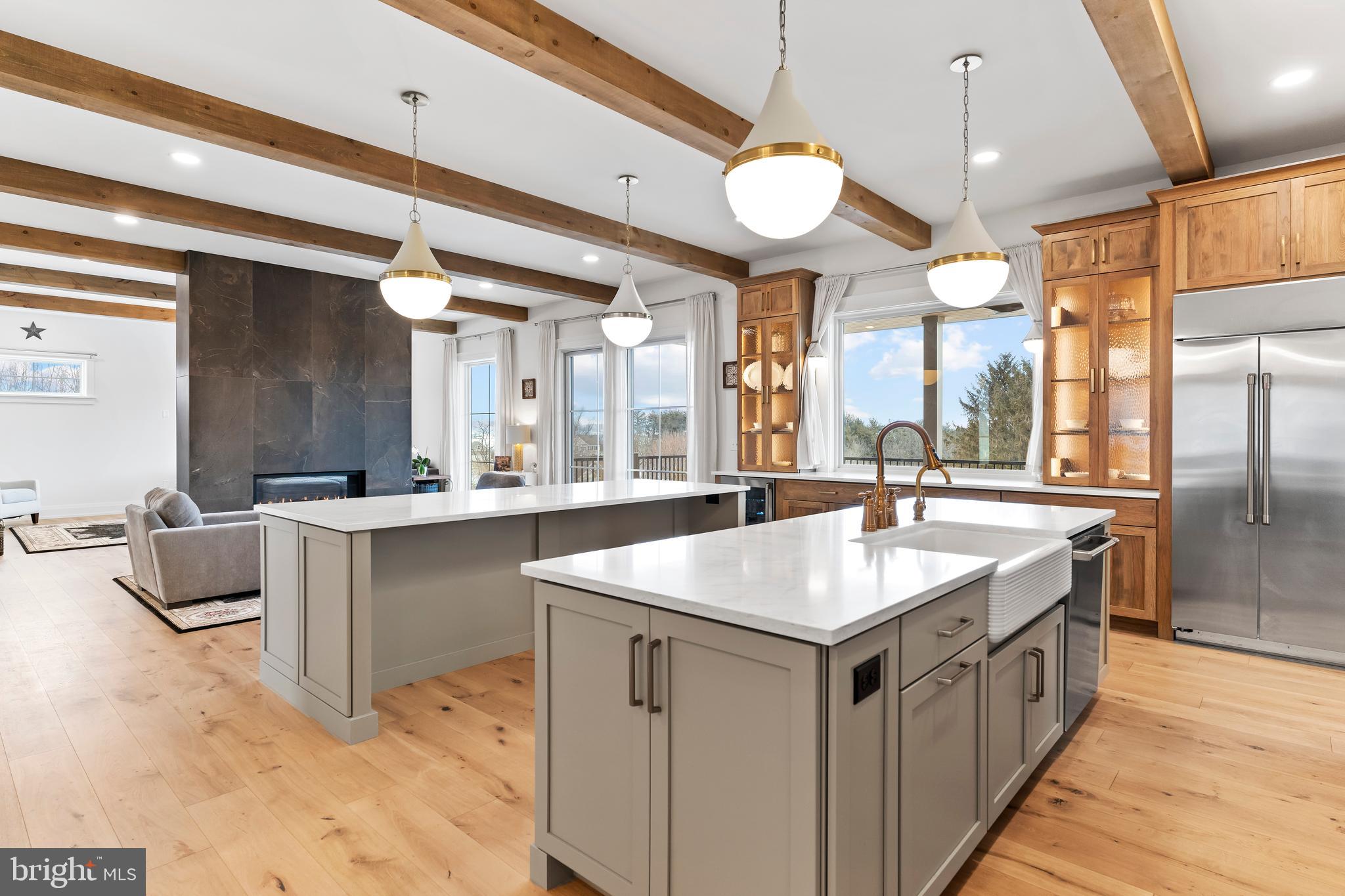 1 Strawberry Lane Lititz, PA 17543 - Photo 28 of 80 a kitchen with kitchen island granite countertop a sink and dishwasher with a kitchen island