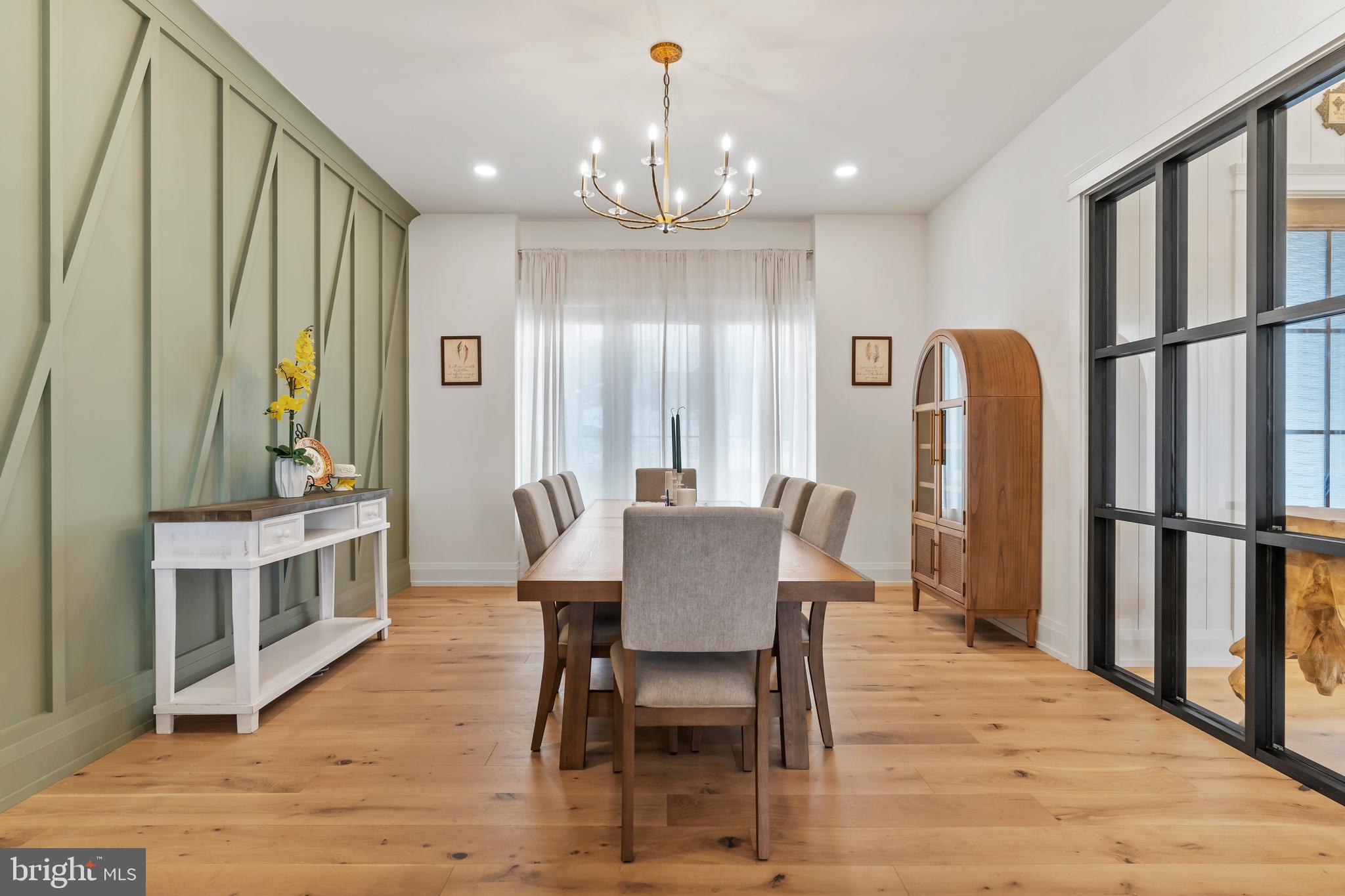 1 Strawberry Lane Lititz, PA 17543 - Photo 29 of 102 a view of a a dining room with furniture window and wooden floor
