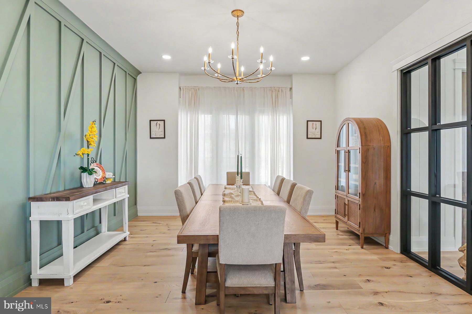 1 Strawberry Lane Lititz, PA 17543 - Photo 32 of 102 a view of a a dining room with furniture window and wooden floor