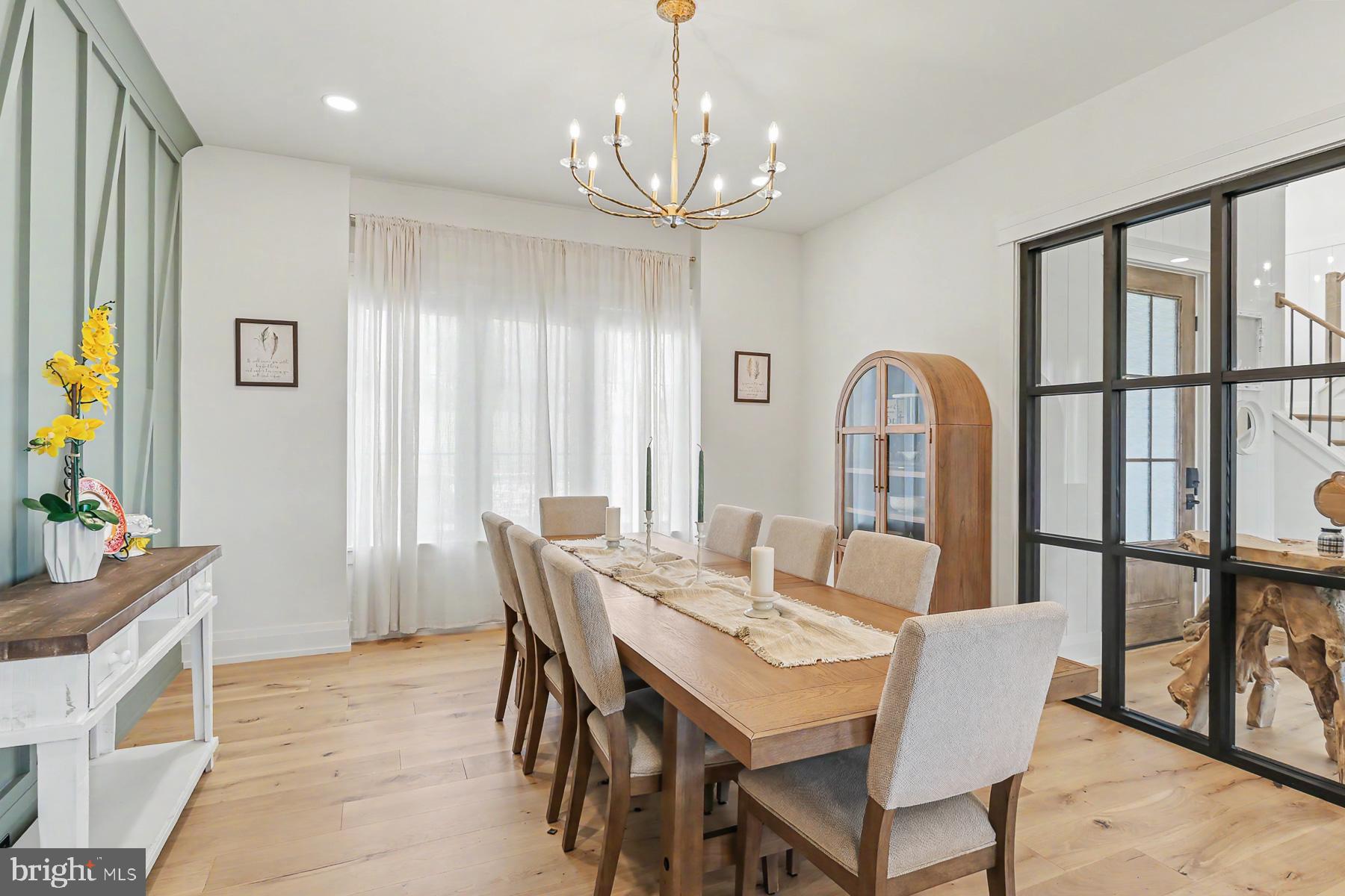 1 Strawberry Lane Lititz, PA 17543 - Photo 33 of 102 a view of a dining room with furniture window and wooden floor