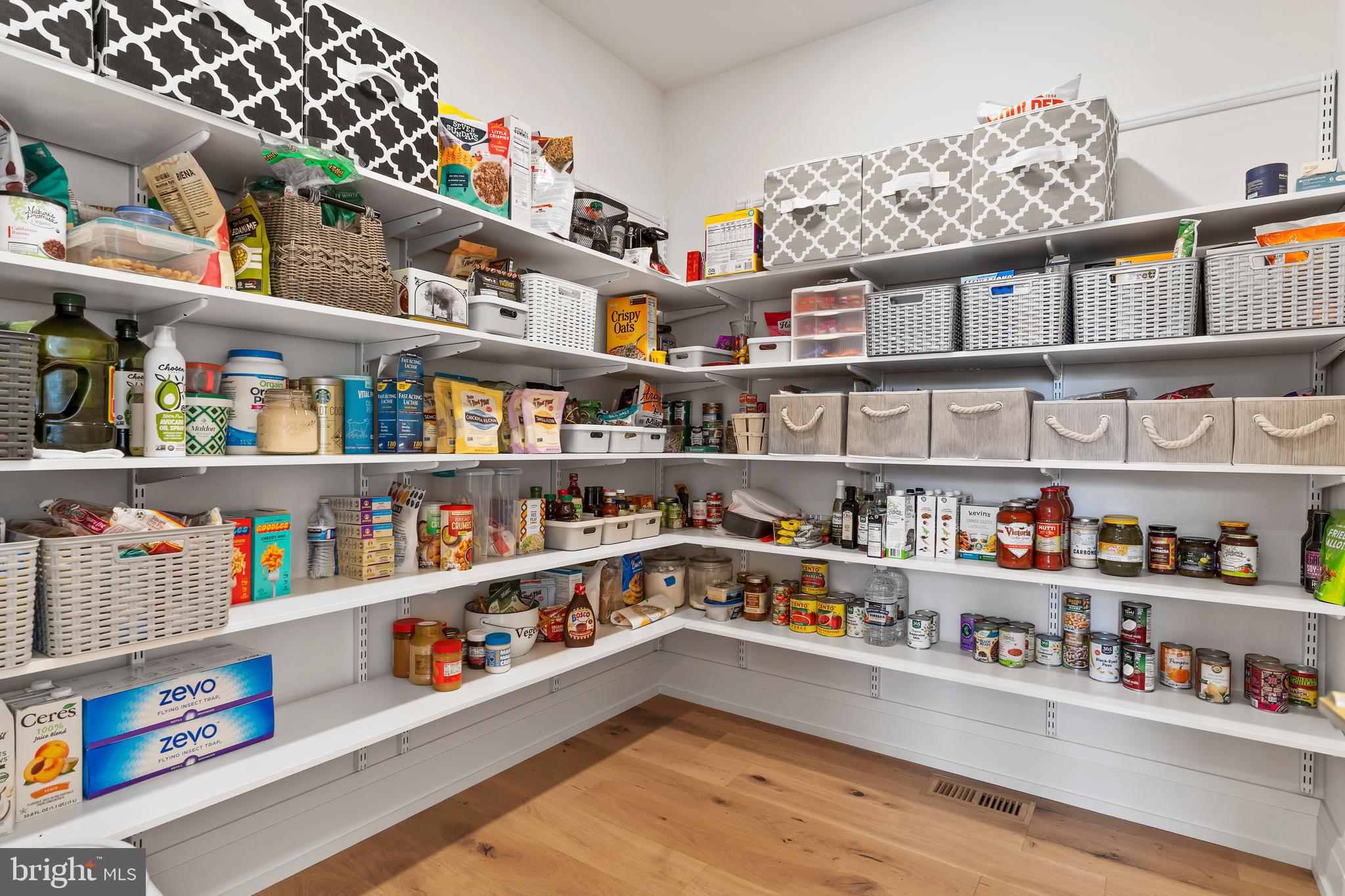 1 Strawberry Lane Lititz, PA 17543 - Photo 34 of 80 a room with lots of books and knick knacks on it