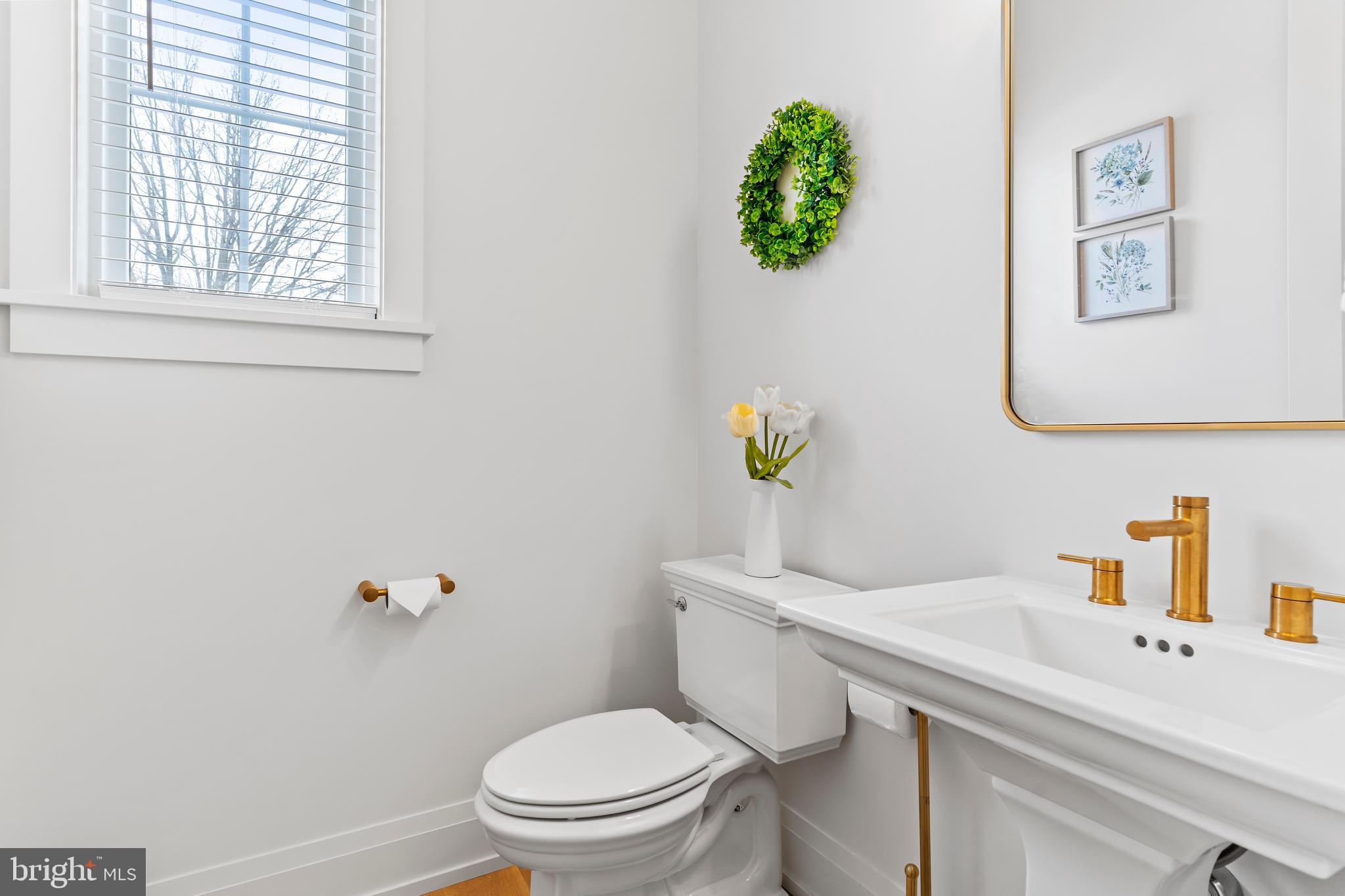 1 Strawberry Lane Lititz, PA 17543 - Photo 37 of 80 a bathroom with a sink mirror vanity and toilet