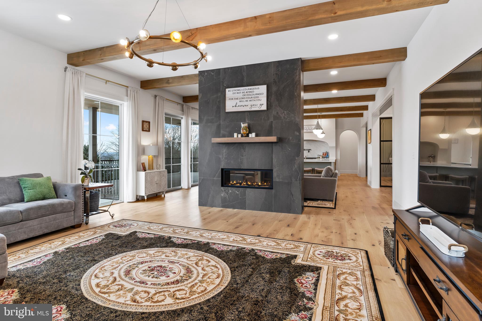 1 Strawberry Lane Lititz, PA 17543 - Photo 42 of 80 a large kitchen with stainless steel appliances granite countertop a granite counter tops and a view of living room