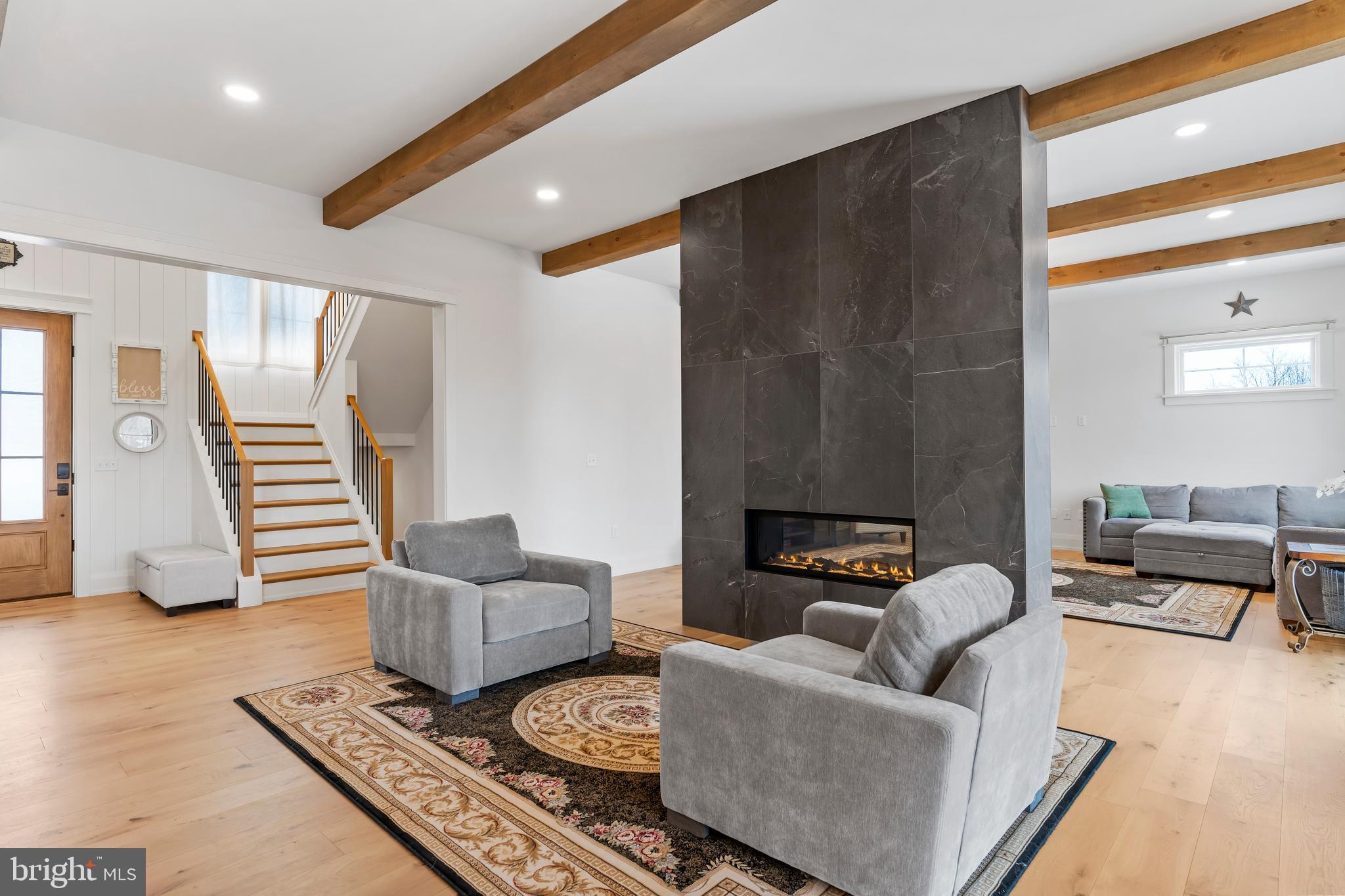 1 Strawberry Lane Lititz, PA 17543 - Photo 45 of 80 a living room with furniture and a fireplace