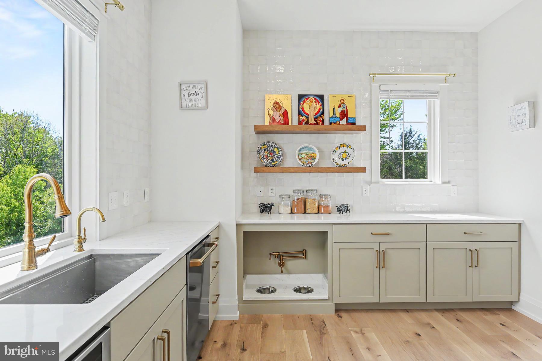 1 Strawberry Lane Lititz, PA 17543 - Photo 60 of 102 a kitchen with a sink cabinets and a window