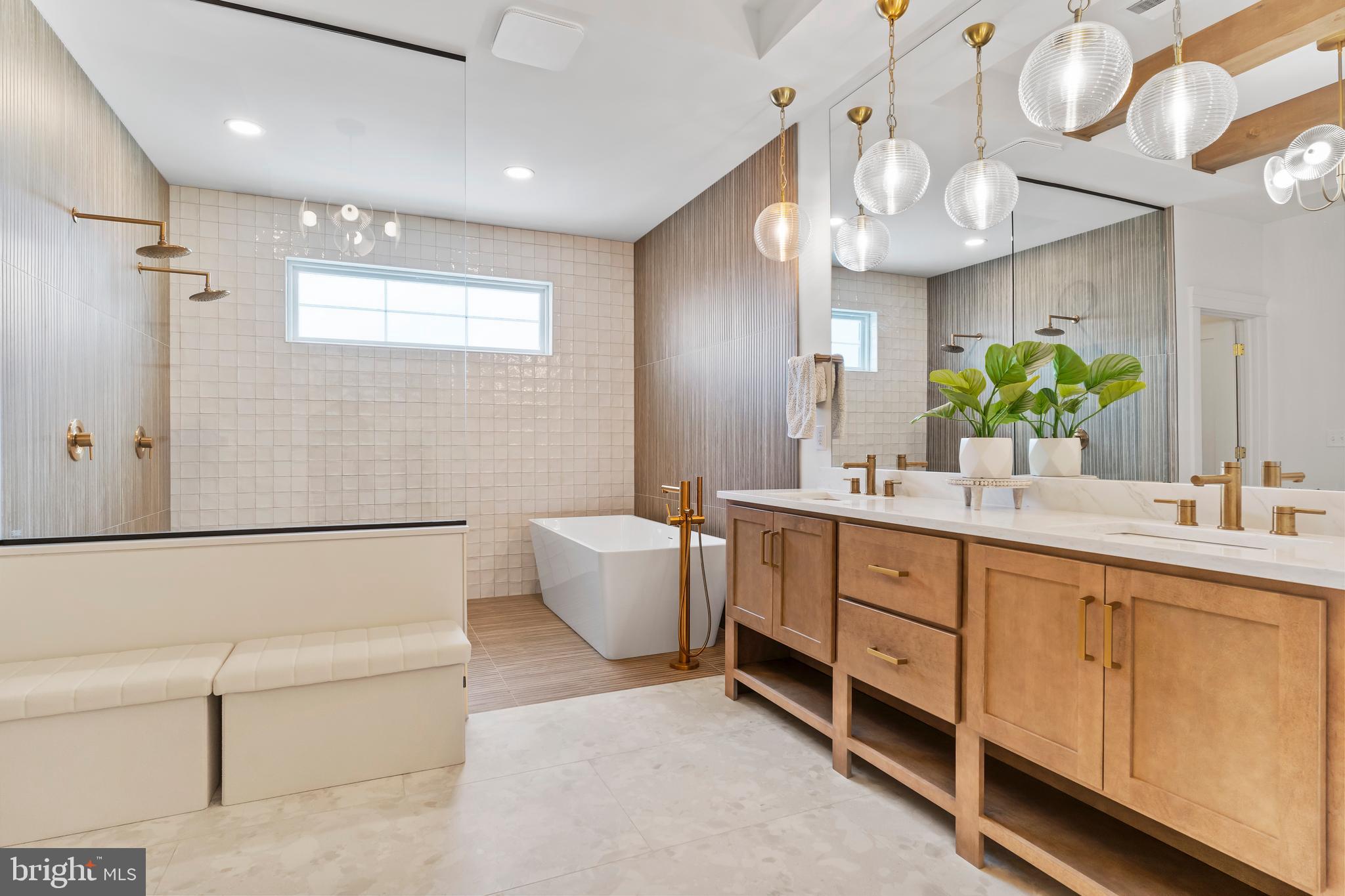 1 Strawberry Lane Lititz, PA 17543 - Photo 62 of 80 a spacious bathroom with a double vanity sink mirror and bathtub