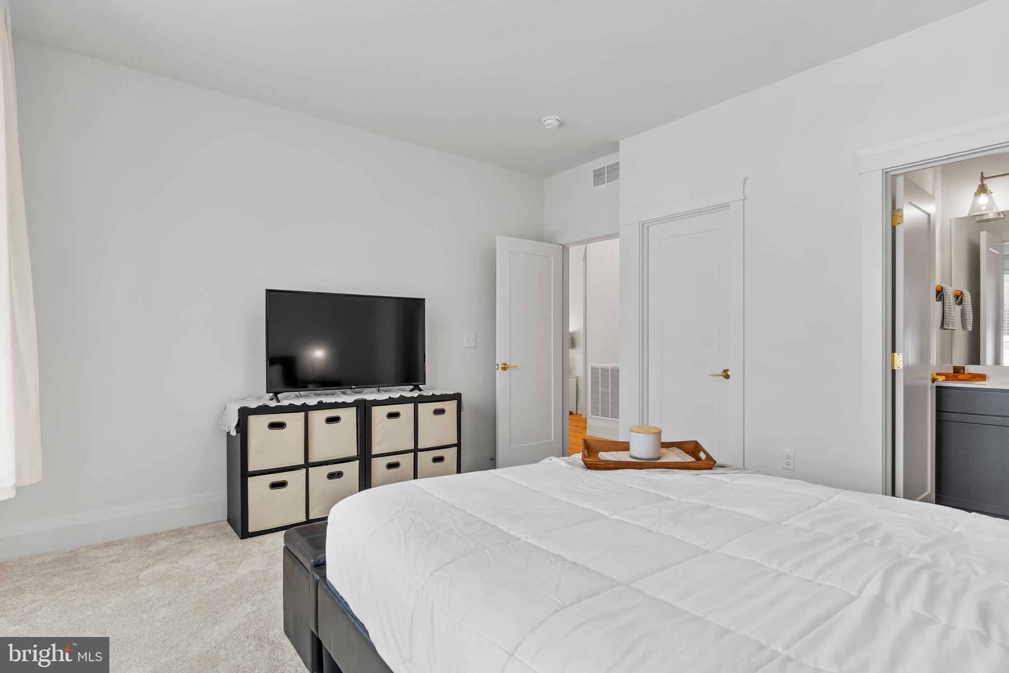 1 Strawberry Lane Lititz, PA 17543 - Photo 68 of 80 a bedroom with a bed and a flat screen tv