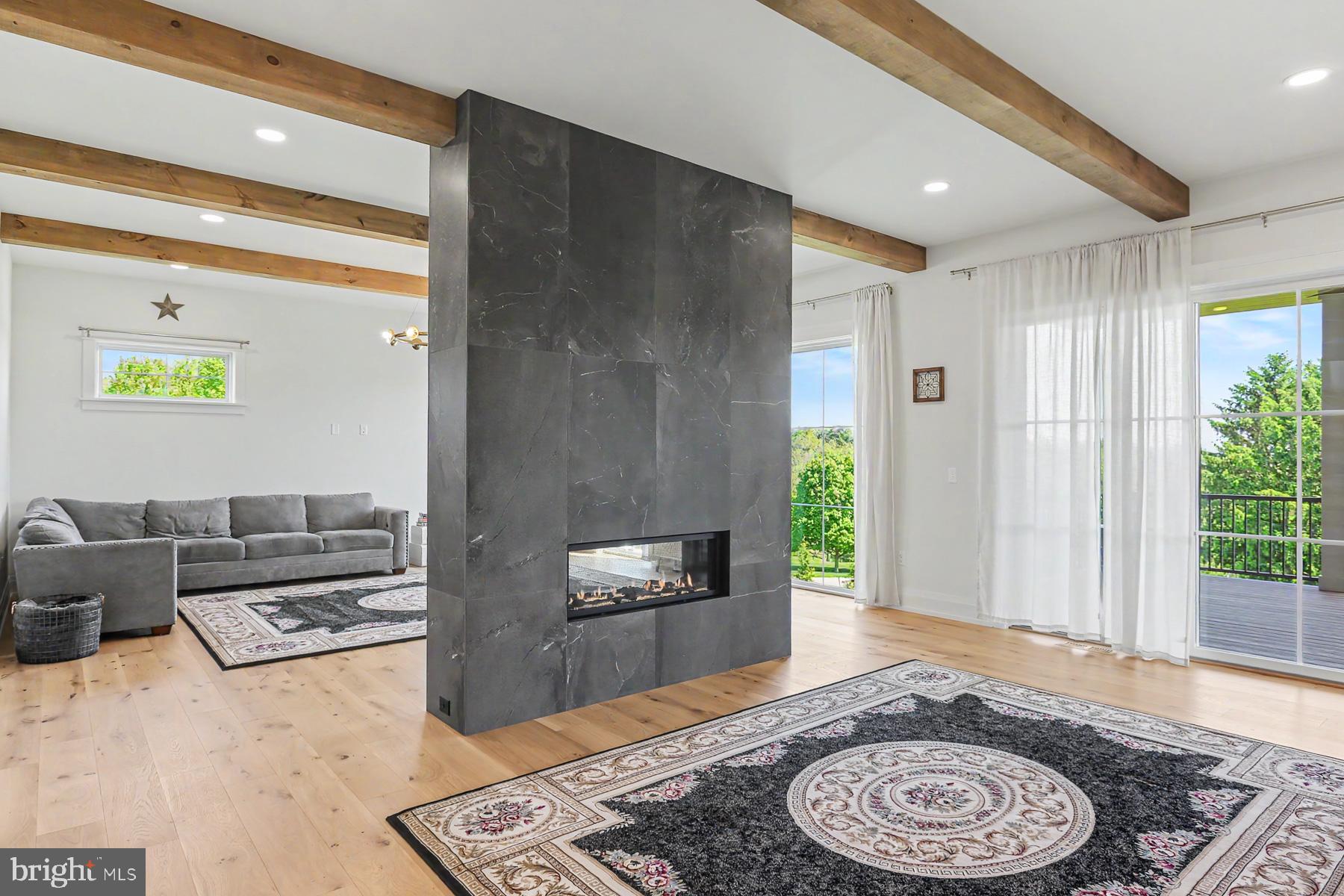 1 Strawberry Lane Lititz, PA 17543 - Photo 73 of 102 a living room with furniture and a wooden floor