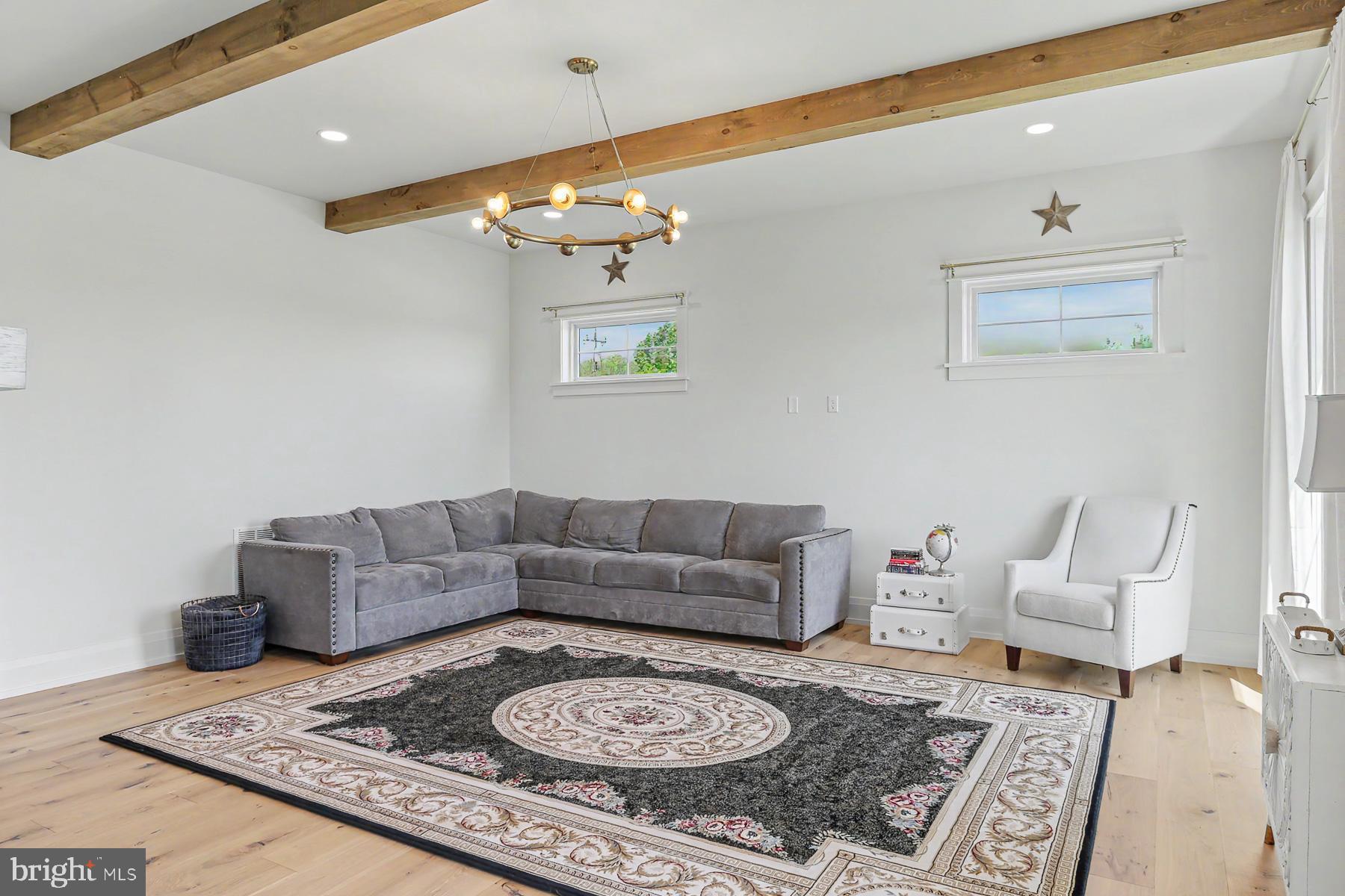 1 Strawberry Lane Lititz, PA 17543 - Photo 75 of 102 a living room with furniture and a rug