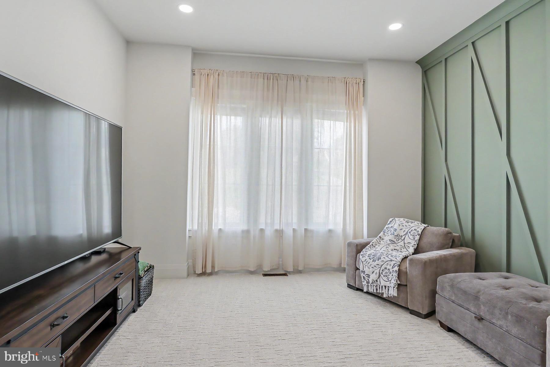 1 Strawberry Lane Lititz, PA 17543 - Photo 79 of 102 a living room with furniture and a window