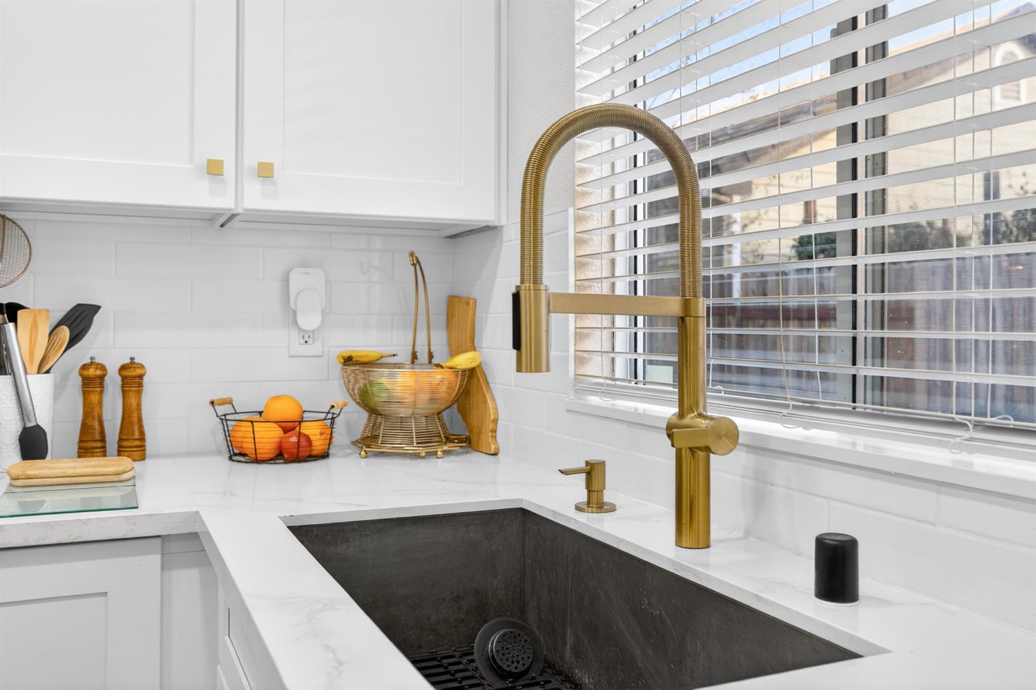 9365 Laguna Pointe Way Elk Grove, CA 95758 - Photo 12 of 24 a kitchen with a sink and a window