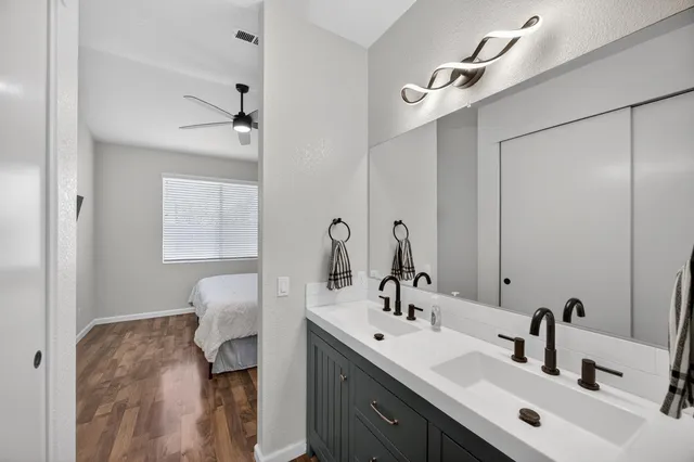 a bathroom with a shower and a tub