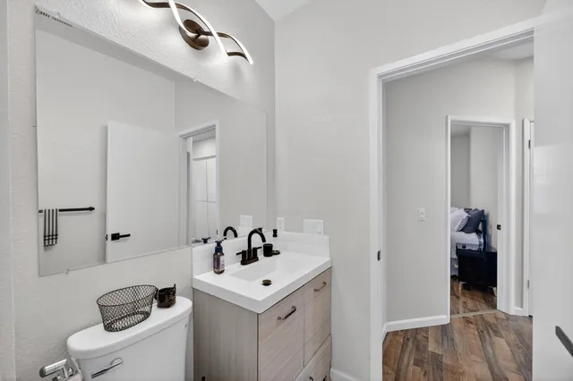 a view of a chairs and table in patio