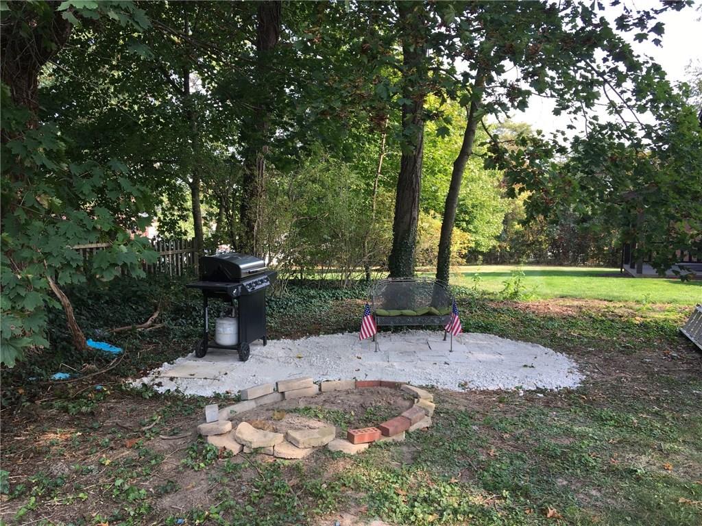 2904 Brodhead Road Aliquippa, PA 15001 - Photo 19 of 20 Fire pit in rear of property. Add some benches and roast some marshmallows while the hot dogs are on the grill.