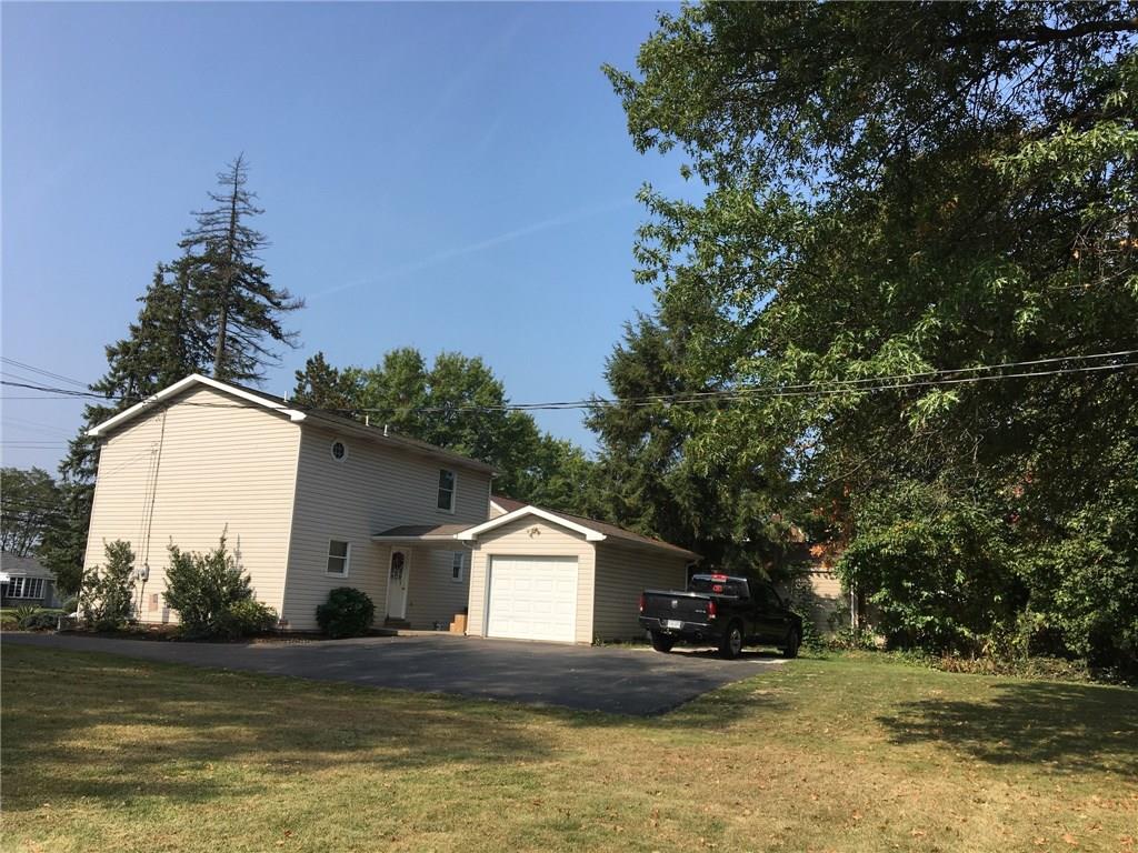2904 Brodhead Road Aliquippa, PA 15001 - Photo 20 of 20 Rear Exterior. Covered access and patio for rainy and snowy days. Detached garage and parking pad.