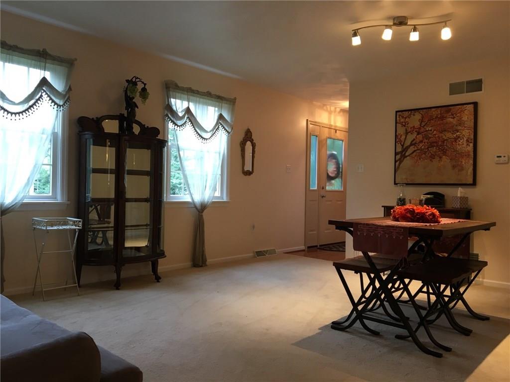 2904 Brodhead Road Aliquippa, PA 15001 - Photo 7 of 20 Combined LIVING AND DINING ROOM 18X12 Room for both formal seating and dining. Or use as a Living Room only. Carpeted with neutral wall tones making it a blank slate for your tastes.