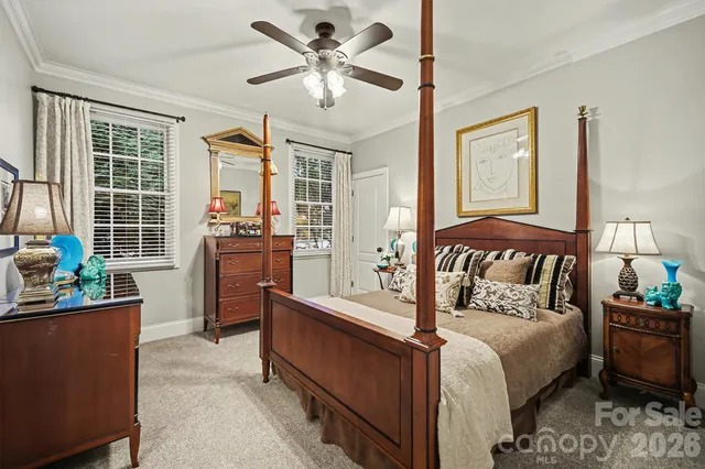 a bed room with a bed and a couch