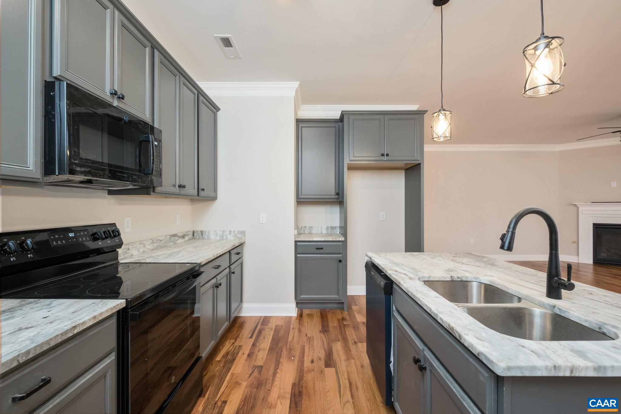 2524 Belvue Road Waynesboro, VA 22980 - Photo 20 of 51 Beautiful hardwood flooring in the kitchen, with plenty and cabinetry and countertop space.