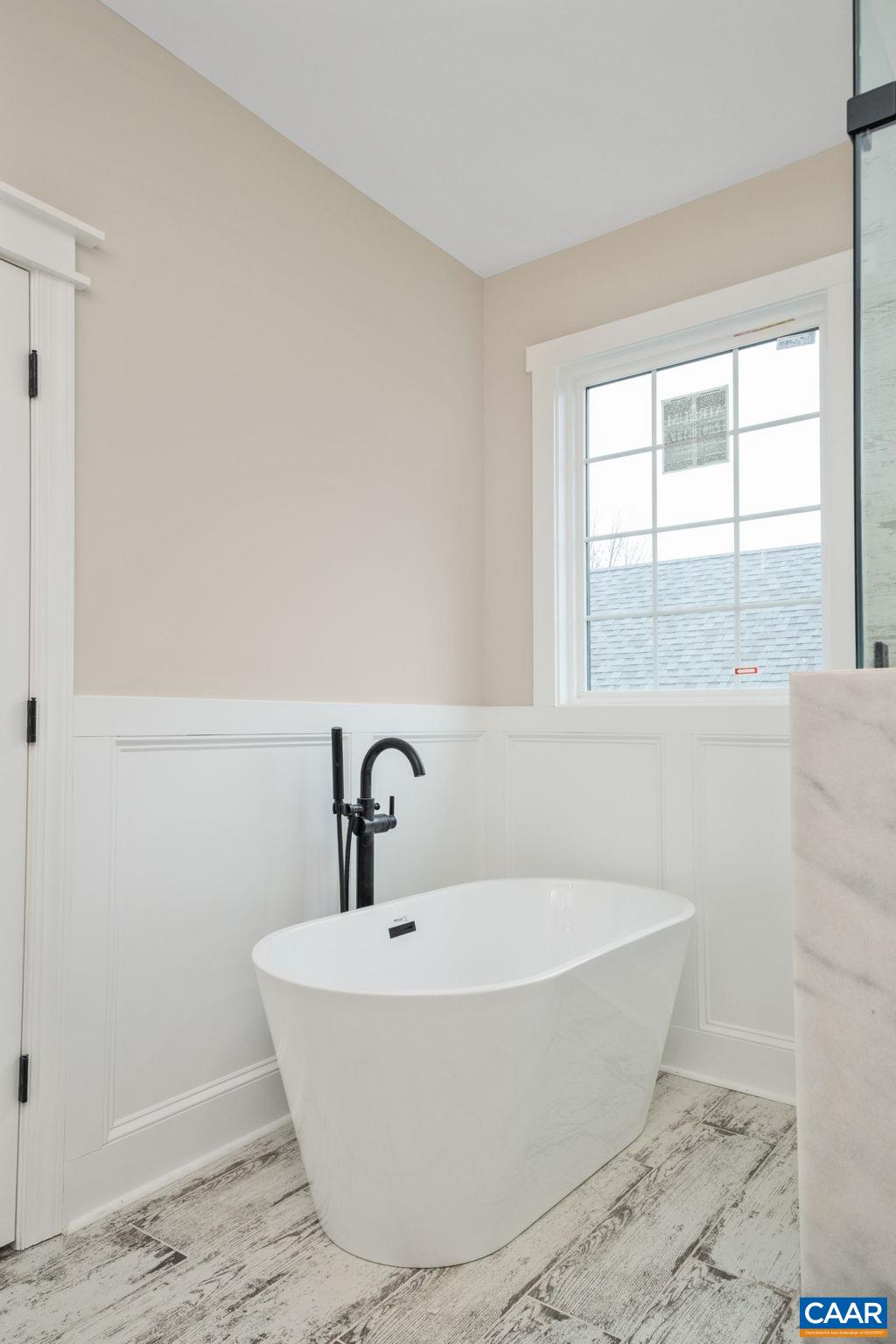 2524 Belvue Road Waynesboro, VA 22980 - Photo 34 of 51 The primary bathroom features dual vanities and a large tiled shower. This picture is of the current new construction property.