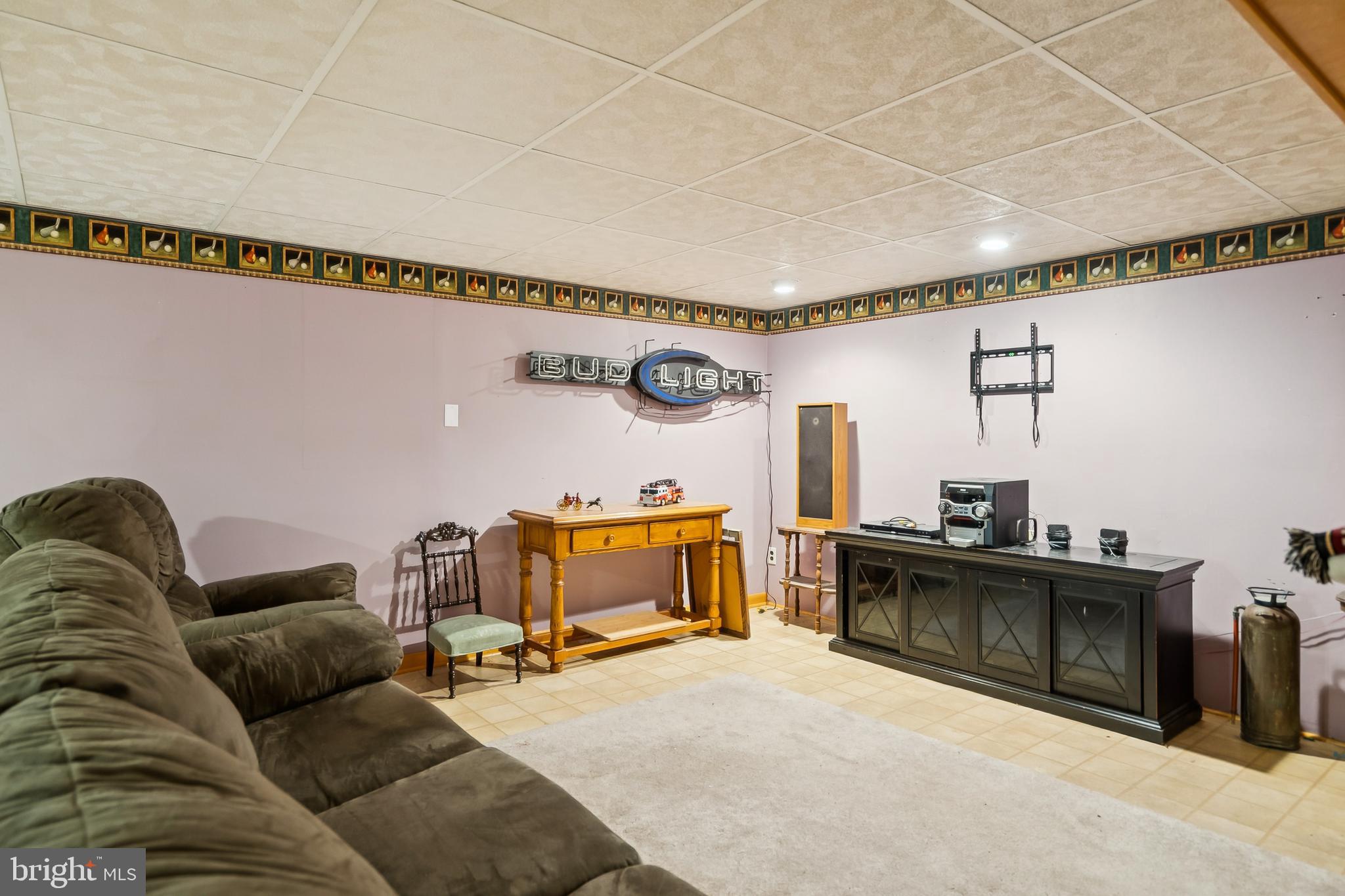 360 Station Road Roebling, NJ 08554 - Photo 20 of 28 a living room with furniture and a flat screen tv