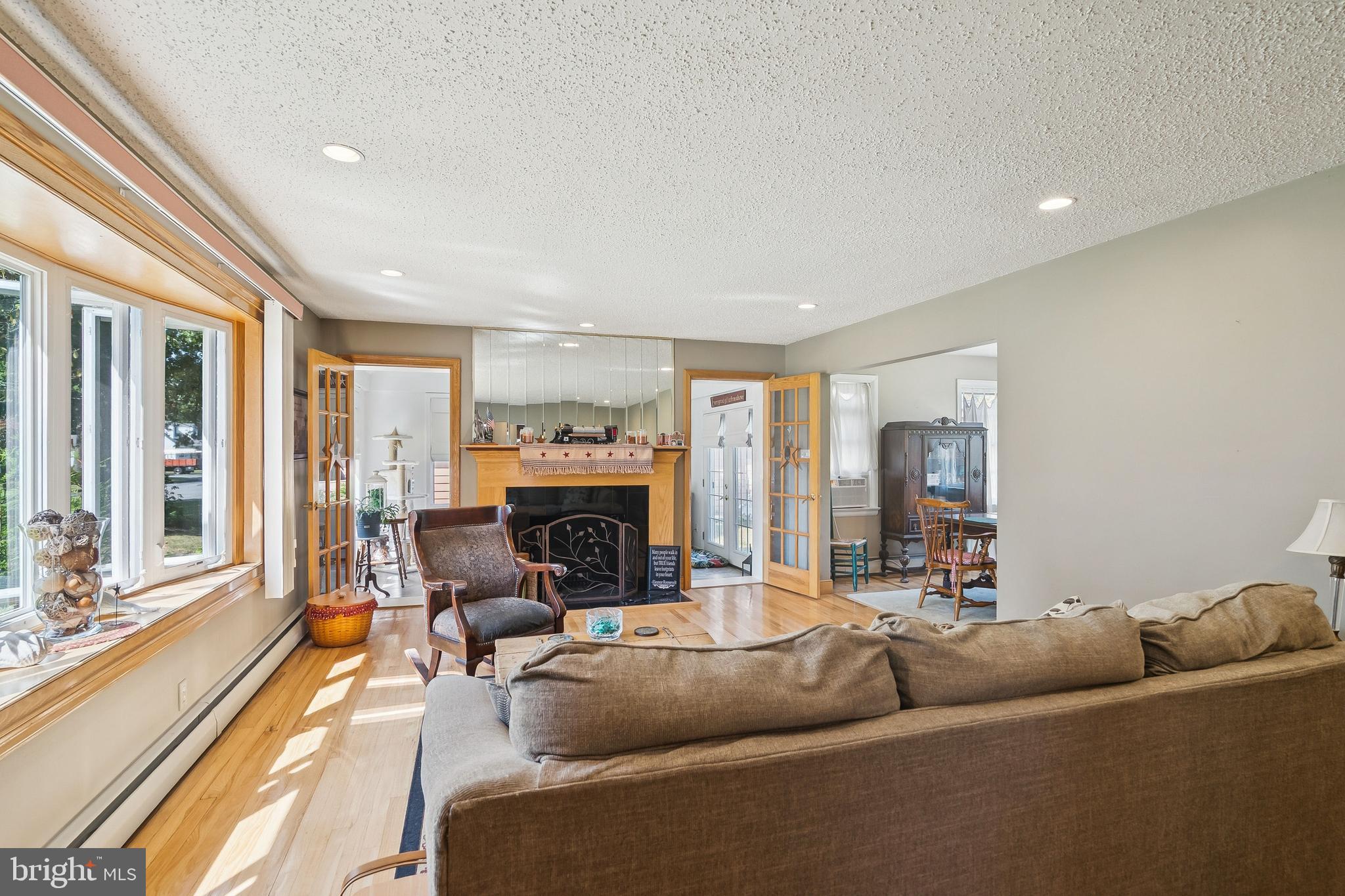 360 Station Road Roebling, NJ 08554 - Photo 4 of 28 a living room with furniture and a fireplace