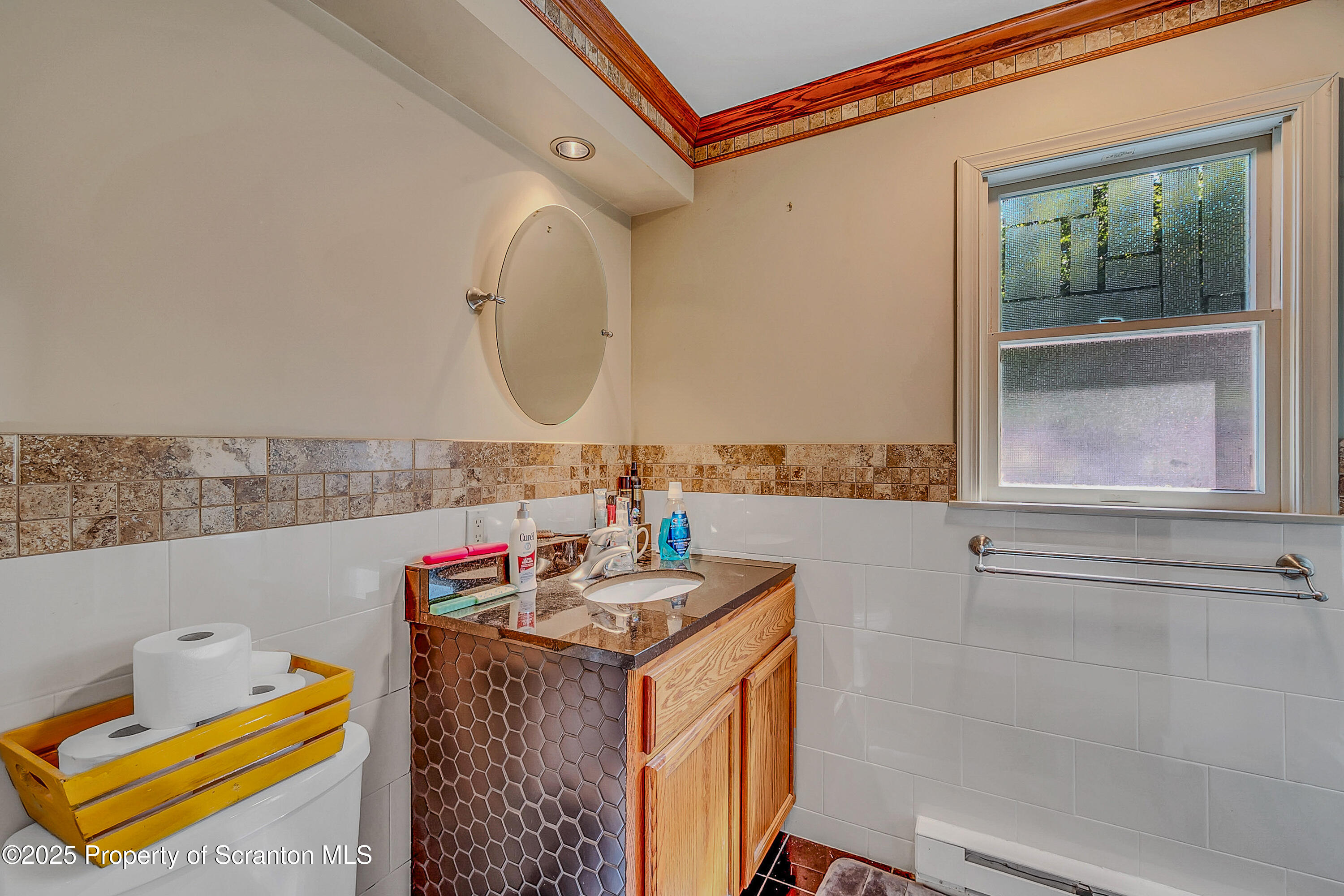 831 Montdale Road Scott Township, PA 18447 - Photo 23 of 46 a bathroom with a sink and a mirror